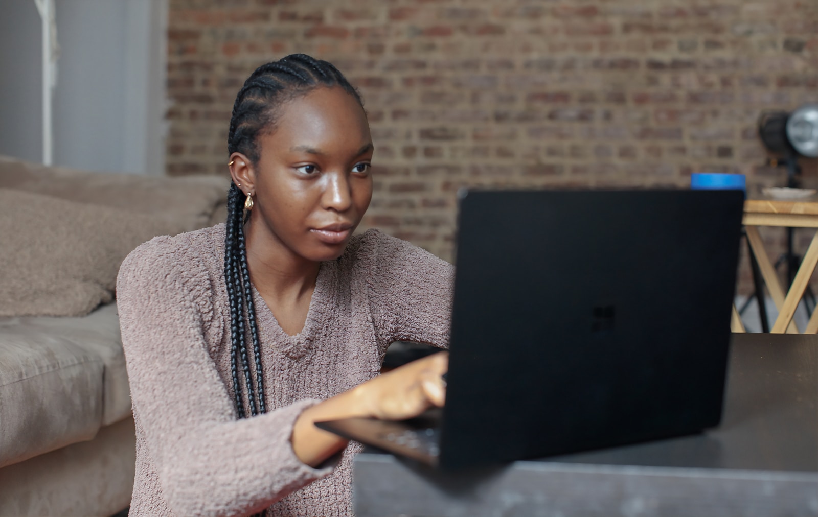 person using black Surface device